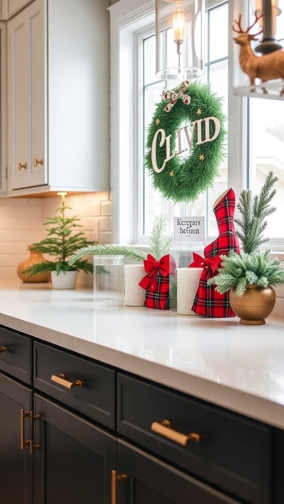 A stylish kitchen countertop decorated for the holidays with a green wreath, potted trees, and festive gifts.