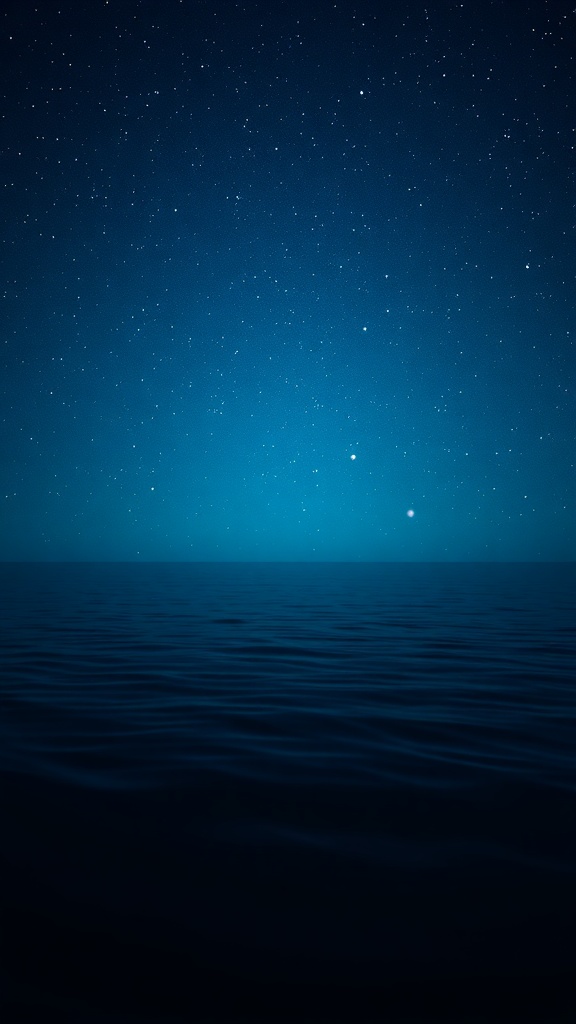 A starry night sky over a calm ocean, showcasing twinkling stars and deep blue water.