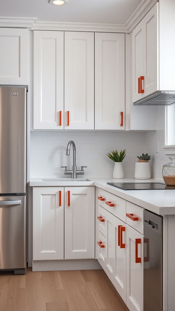 Kitchen featuring white cabinets with bold orange acrylic handles.