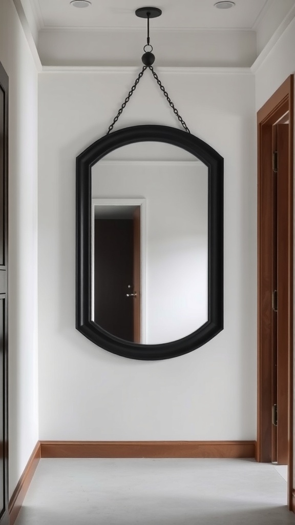 A large black-framed mirror hanging in a narrow hallway, reflecting light and enhancing the space.