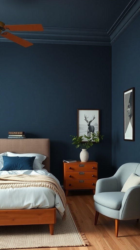 A modern navy blue bedroom featuring a light wood bed frame, nightstand, and a cozy blue chair.