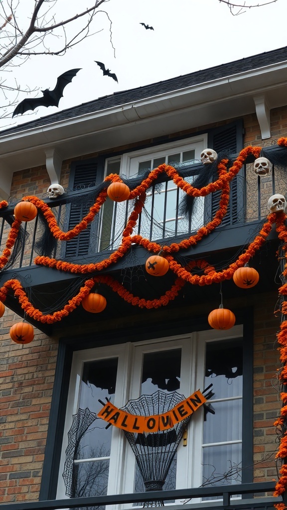 A Halloween balcony decorated with orange garlands, pumpkins, skulls, and bats.