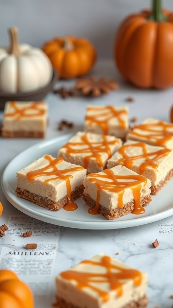 Delicious pumpkin cheesecake bars drizzled with caramel on a white plate, surrounded by pumpkins and autumn decorations.