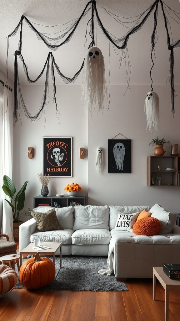A living room decorated for Halloween with ghostly wall art and spooky decor.