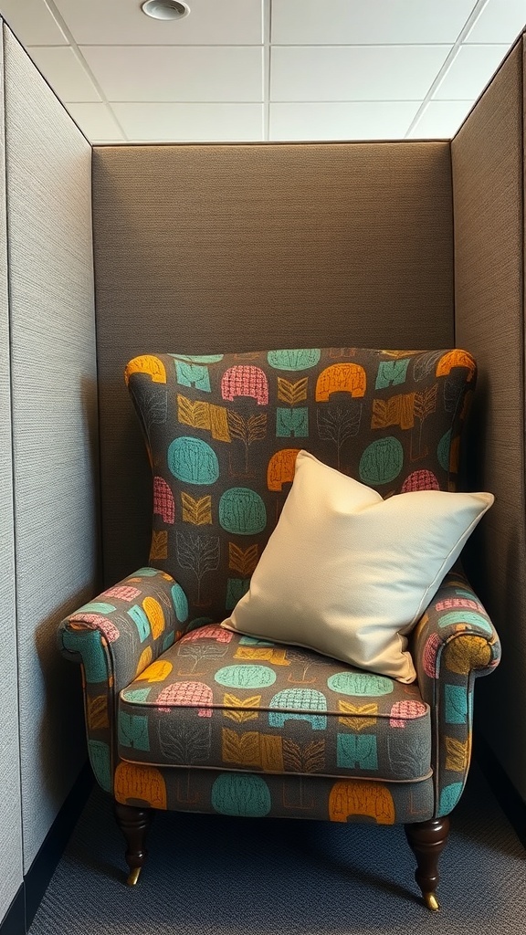 A colorful patterned armchair with a white pillow in a cubicle setting.