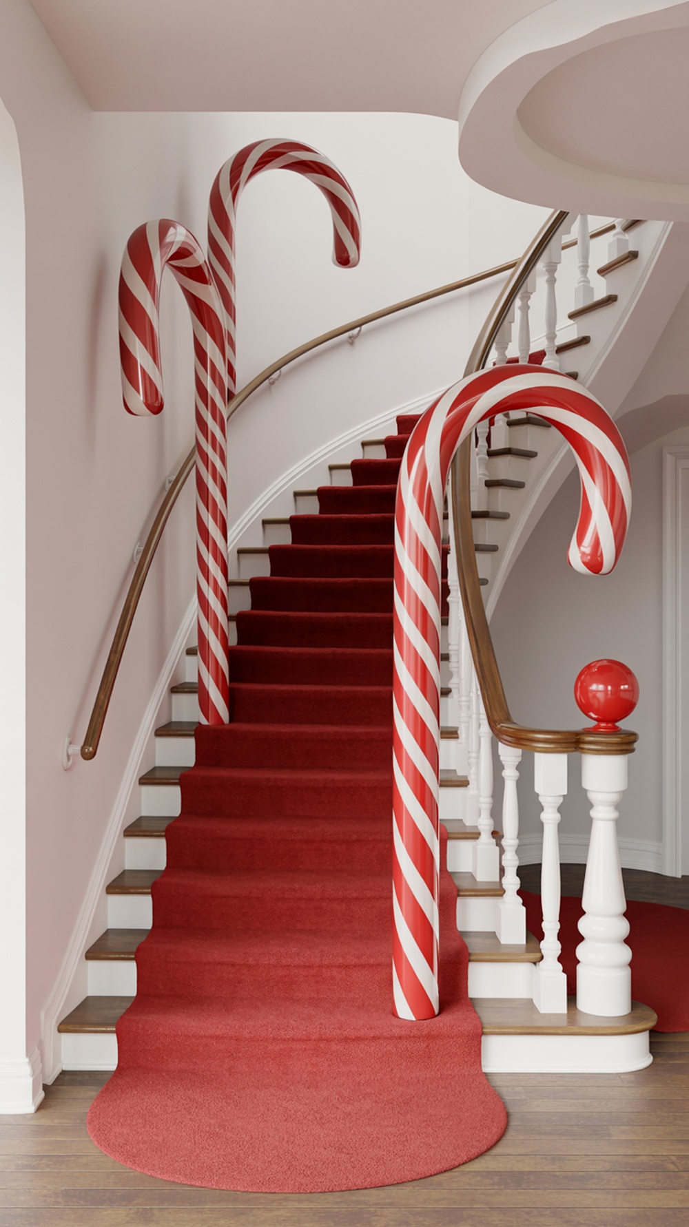 Giant candy canes decorating a staircase with red carpet