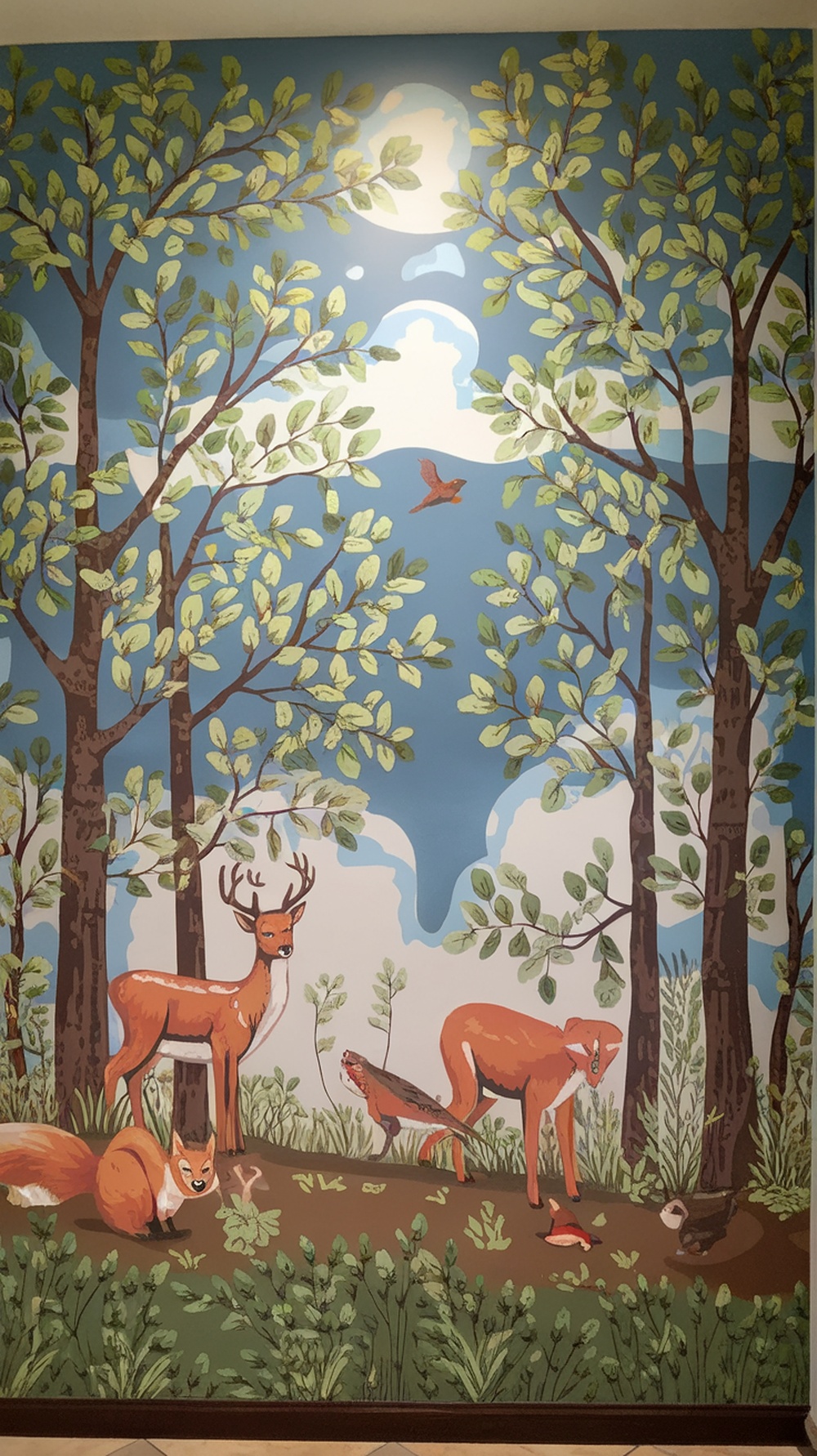 A colorful nature-inspired mural featuring deer, foxes, and birds in a forest setting.