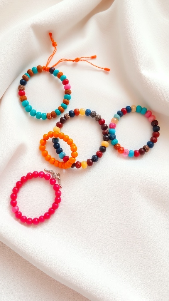 Colorful beaded friendship bracelets on a white fabric background
