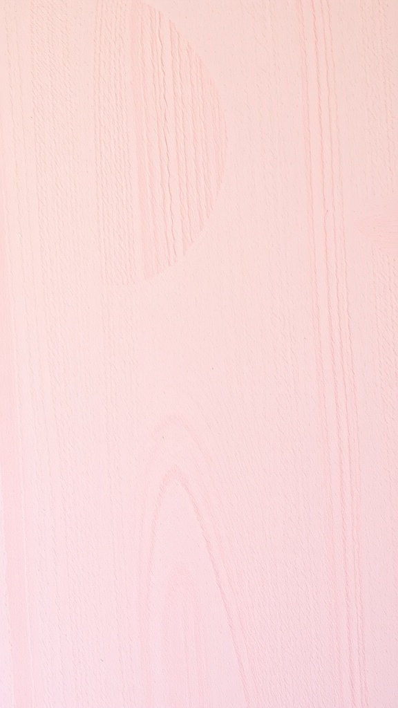 Light pink wallpaper with textured elements