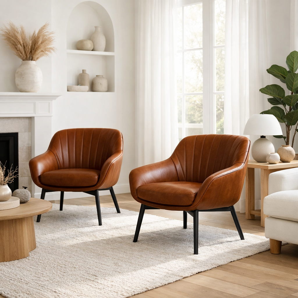 Cozy living room featuring brown accent chairs with large windows and natural decor.