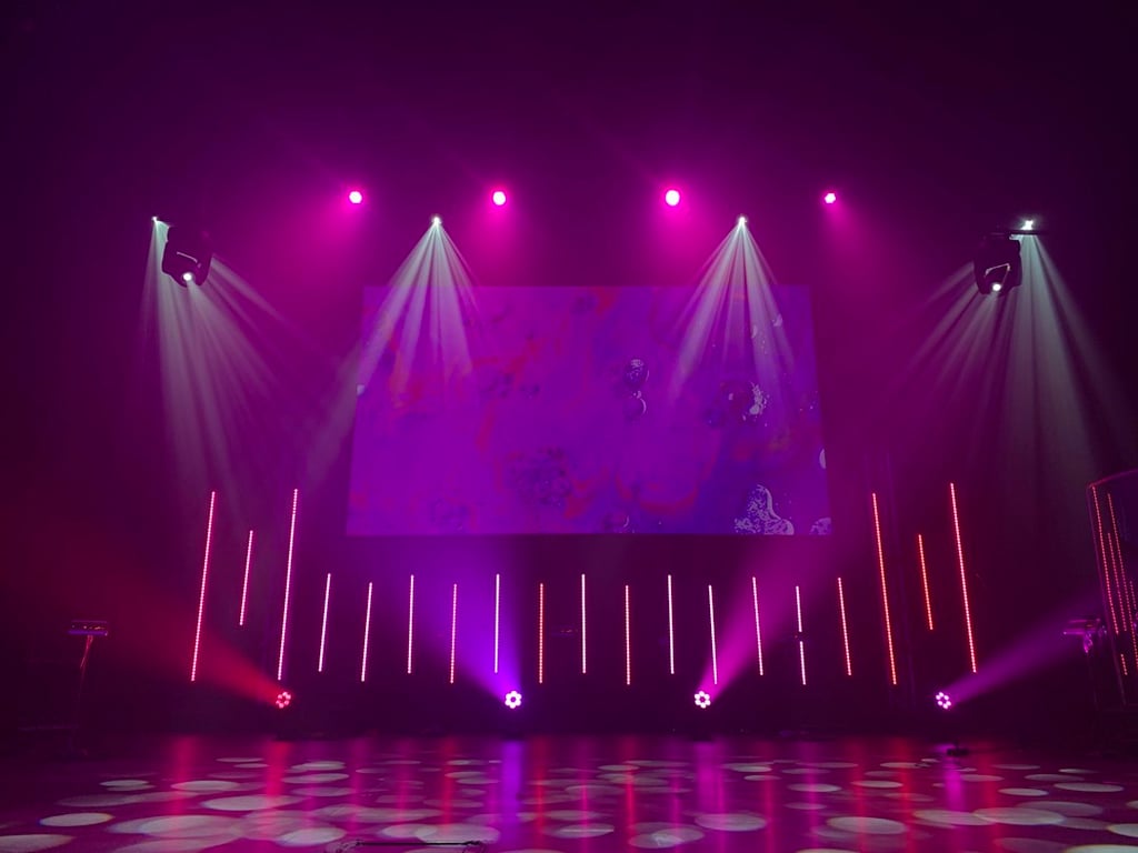 concert stage lights; illustrative, not the fundraiser