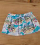 Baby skirt in a seaside pattern fabric to fit 3-6 months.