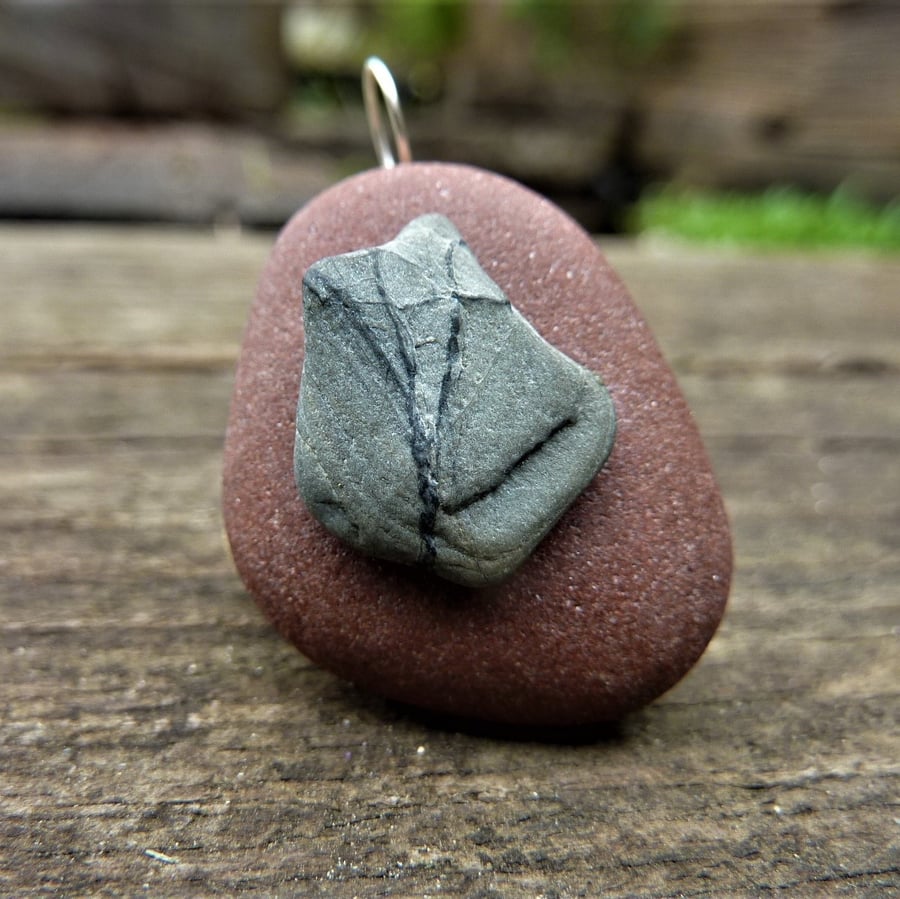 Pendant - dark red sea stone with grey black tree beach pebble