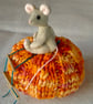 Dora, a tiny jointed mouse sitting on a pumpkin - Image 1