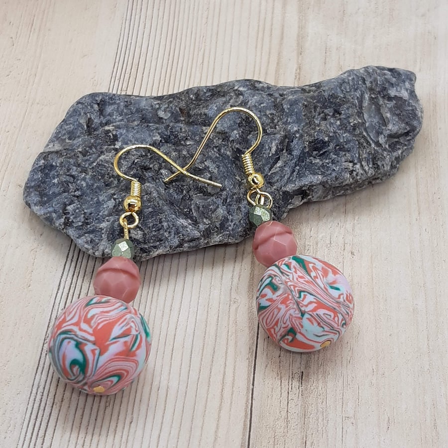 Mint green and coral dangly earrings