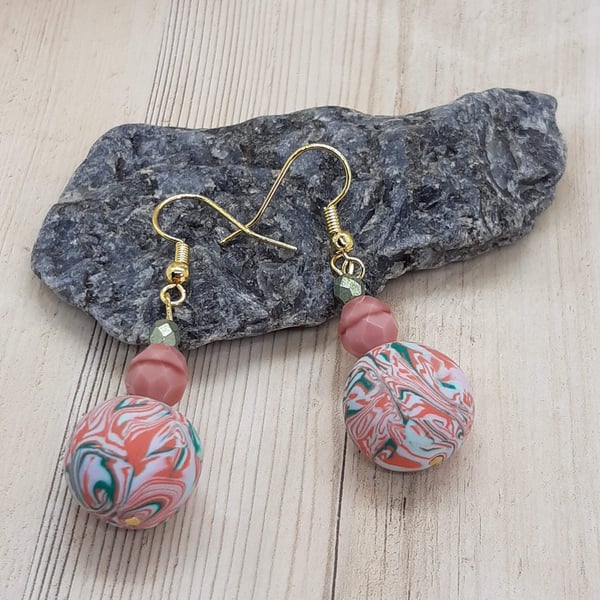 Mint green and coral dangly earrings