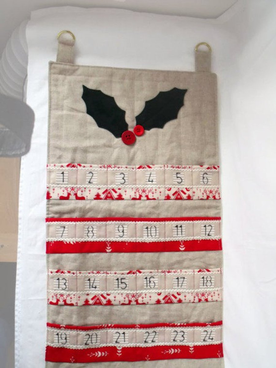holly hanging christmas advent calendar for storing sweets or chocolate in 