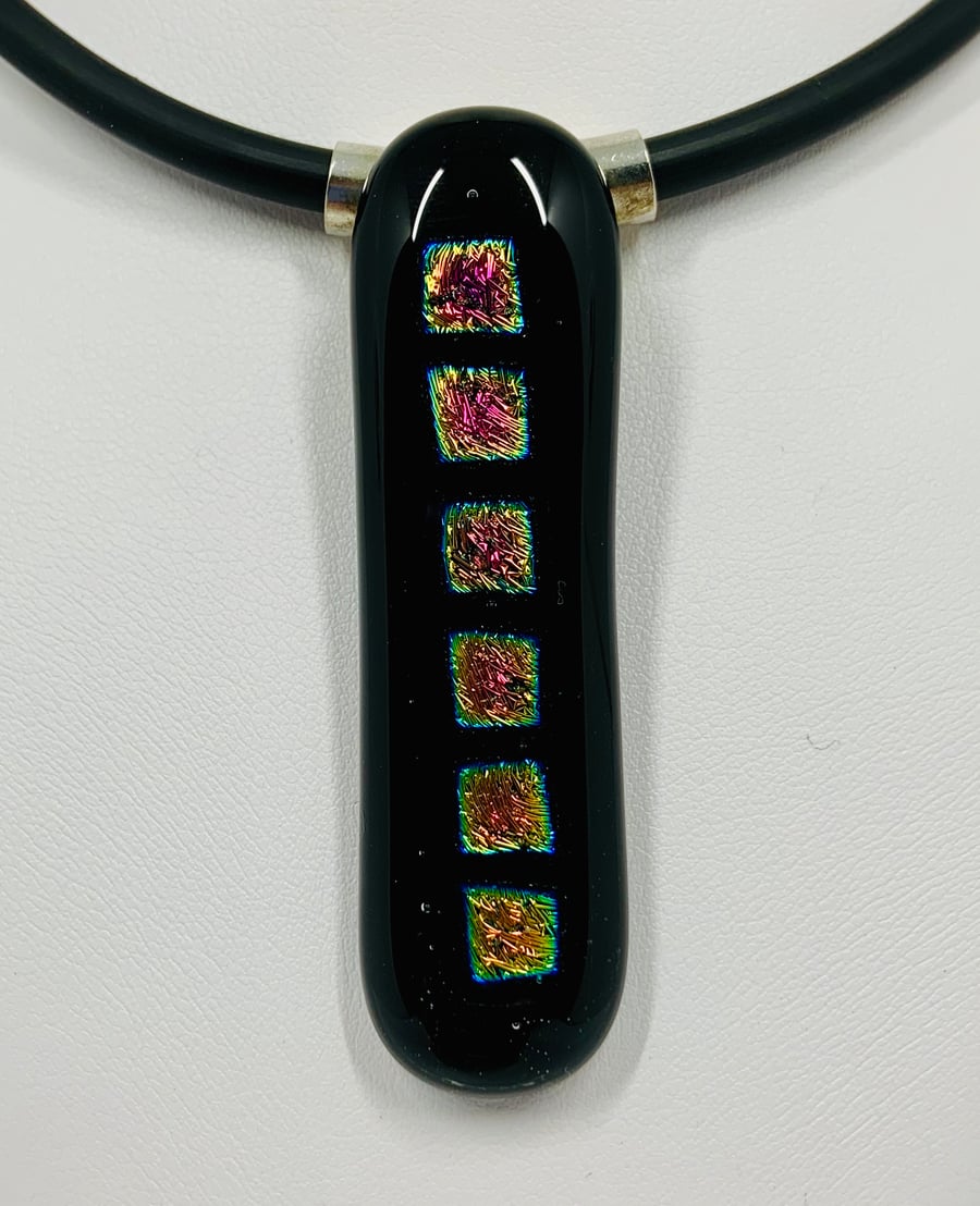 Square design Fused dichroic glass pendant with tube bail and black necklace.