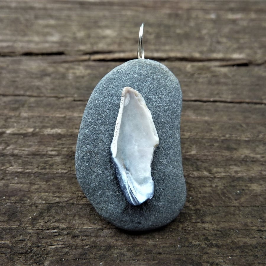 Pendant - shiny white and blue mussel shell on silver grey flat beach pebble
