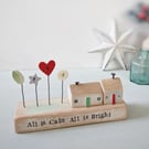 Little Wooden Houses with Christmas Star and Buttons 'All is Calm All is Bright'