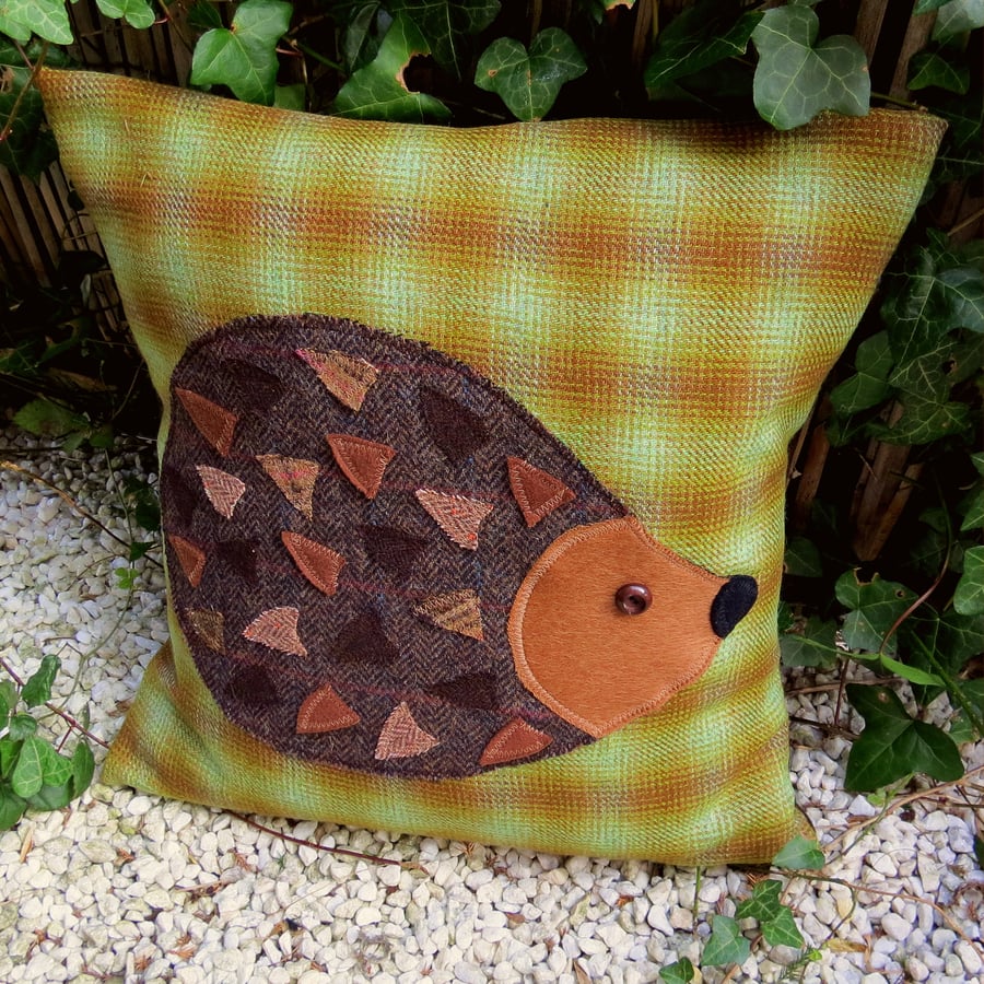 Hedgehog.  A tactile cushion, made from tactile wool. Complete with feather pad.
