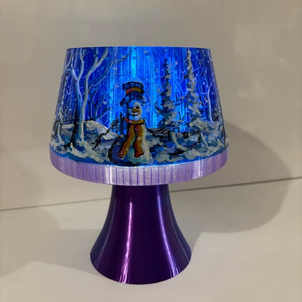 A Christmas lamp created and hand painted by Andrew Jenkins 