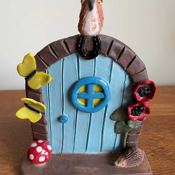 Magical fairy door with poppies