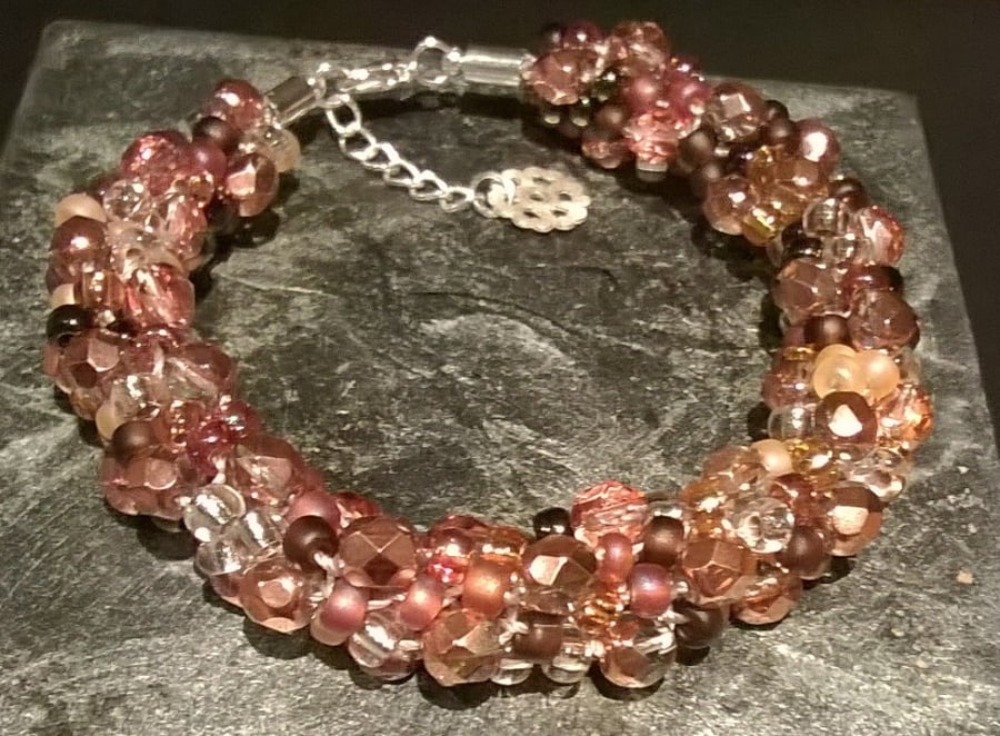 Braided bead copper bronze coloured bracelet