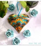  Tin Embossed Heart decoration. Turquoise, Orange and purple pattern. Handmade - Image 1