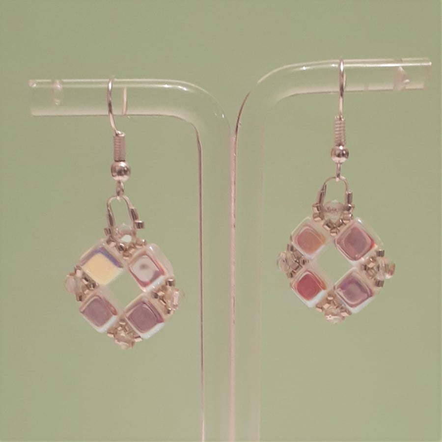 Stylish white AB finish and silver square shaped earrings.