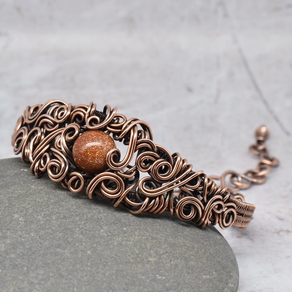 Wire Wrapped Goldstone and Copper Cuff Bracelet