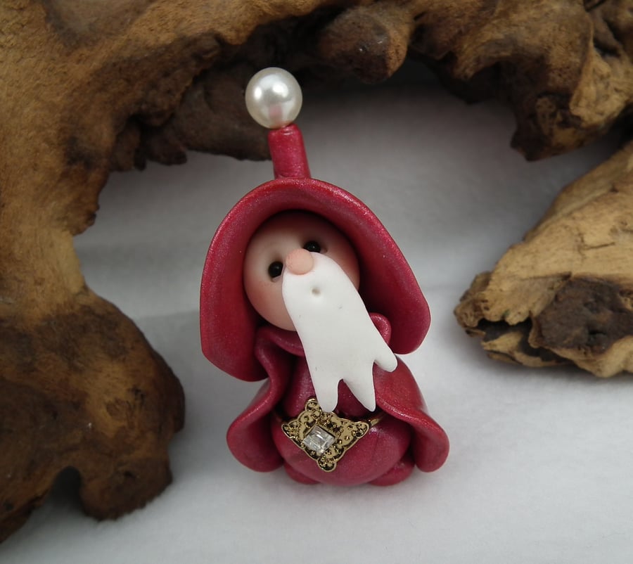 Christmas Santa has arrived in the Gnome Village OOAK Sculpt by Ann Galvin