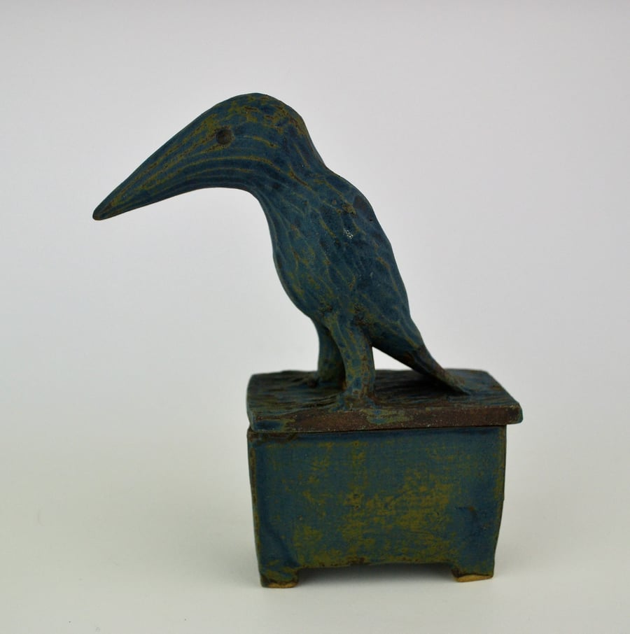 handmade ceramic box with crow sat on top