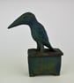 handmade ceramic box with crow sat on top