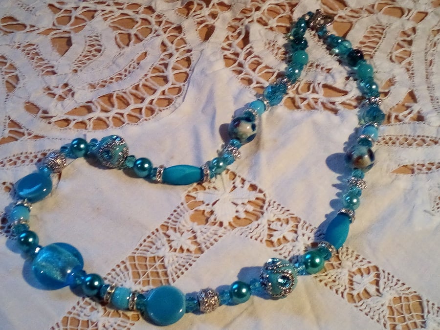 Ice bloom necklace with mixed turquoise glass clay and resin beads