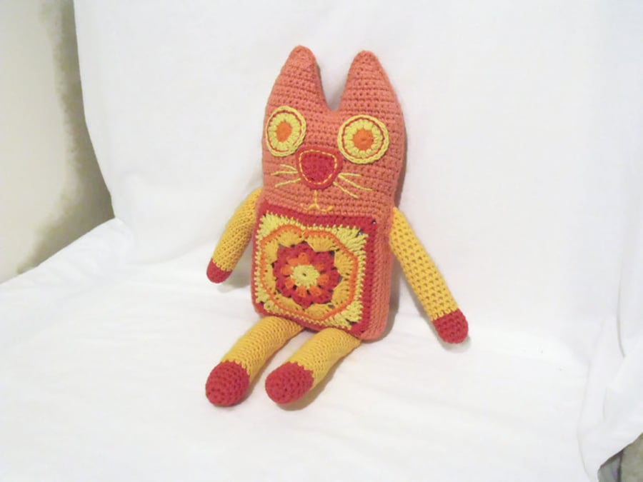 large peach crocheted granny square rag doll amigurumi cat