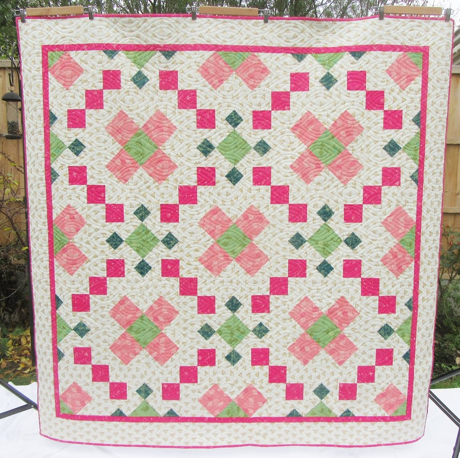 Green and Pink Patchwork Quilt