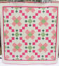 Green and Pink Patchwork Quilt - Image 1