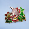 Copper bird with red flowers brooch