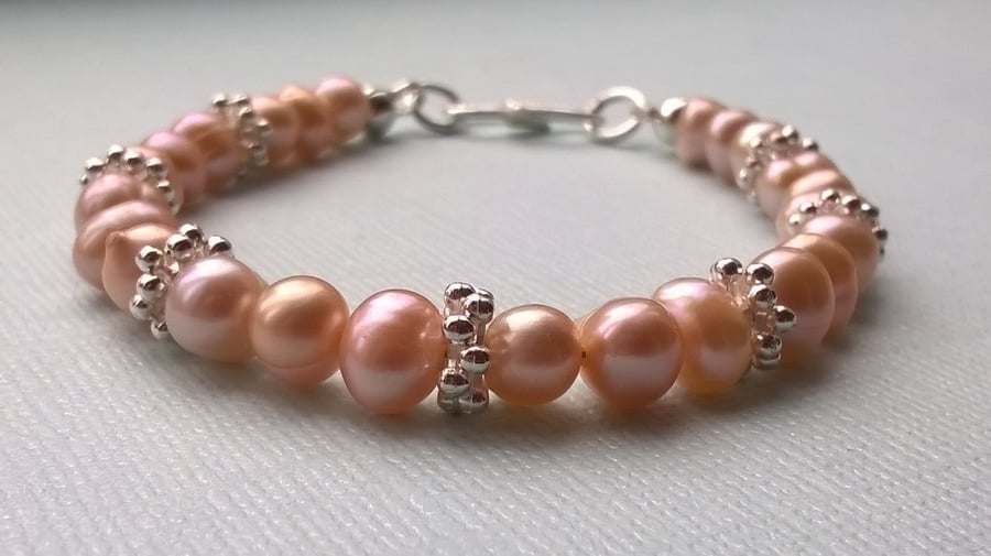 Peach cultured pearl bracelet