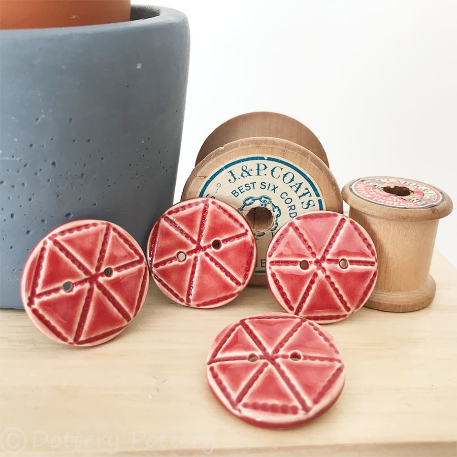 Set of four bright red ceramic handmade buttons