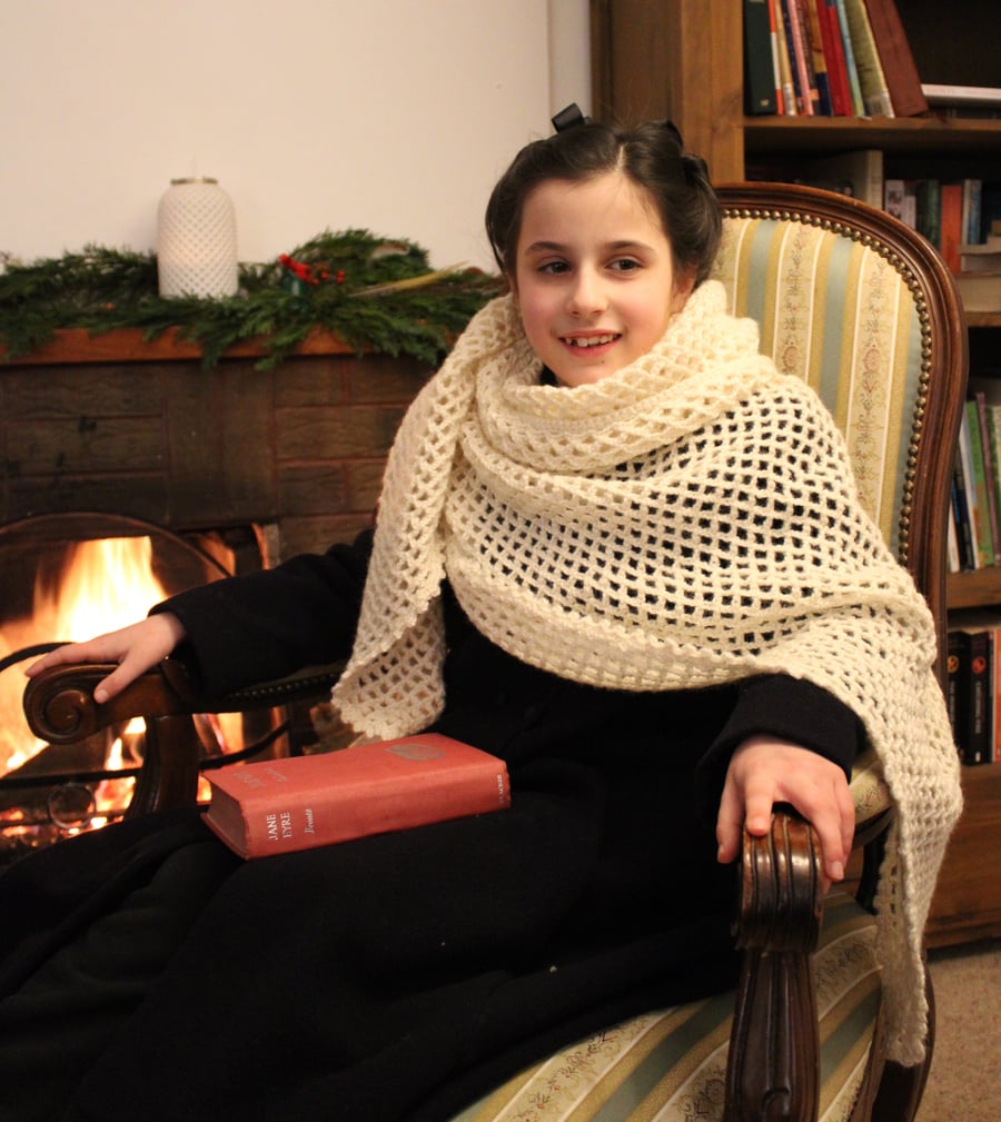 A large triangular woolen shawl