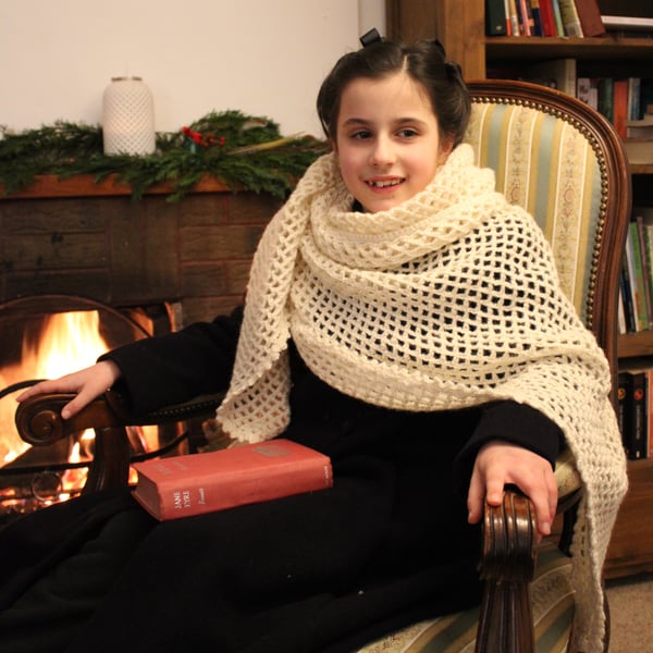 A large triangular woolen shawl