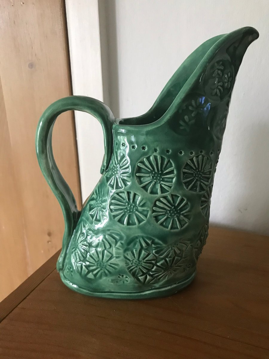 Green stamped textured ceramic jug