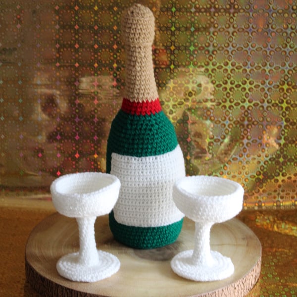 Handmade crochet champagne bottle and glasses set.