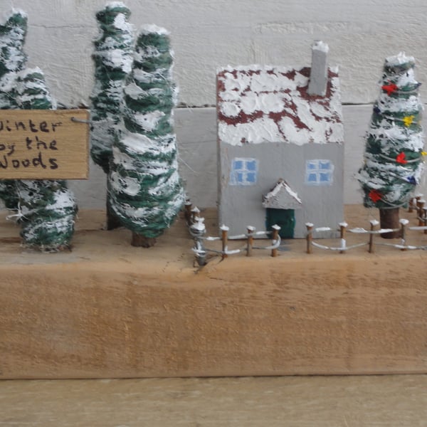 Little wooden cottage at Christmas - scene from reclaimed materials