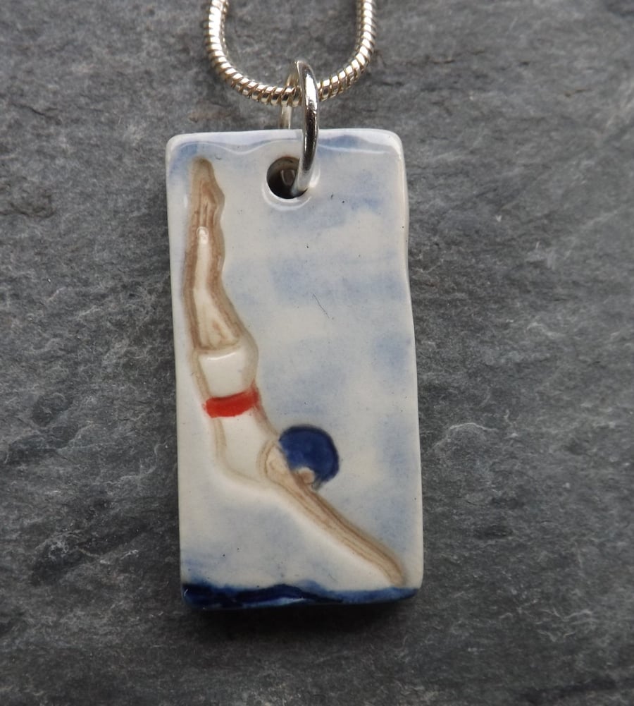 Diving Belle handmade ceramic pendant in red white and blue