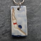 Diving Belle handmade ceramic pendant in red white and blue