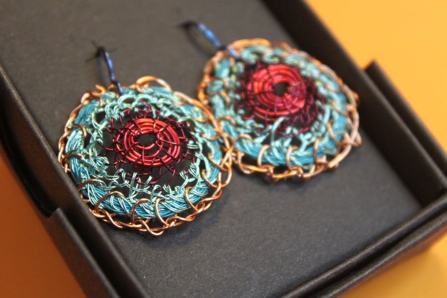 Blue and red disc earrings from recycled materials