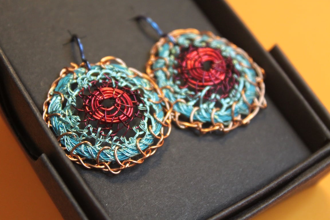 Blue and red disc earrings from recycled materials